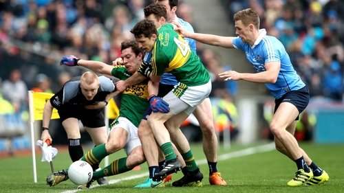 Athletes playing gaelic football Game
